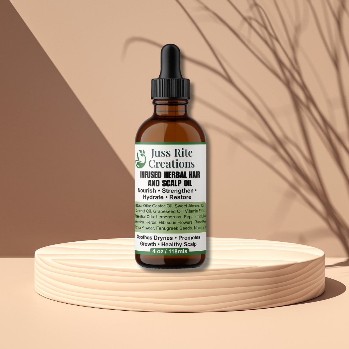 Bottle of Juss Rite Creations infused herbal hair and scalp oil on a beige background