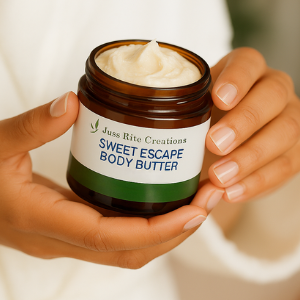 Jar of Sweet Escape Body Butter held by a person with a blurred background