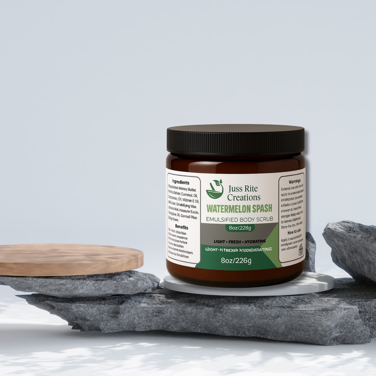 Jar of 'Watermelon Splash' emulsified body scrub on a stone surface with a light gray background