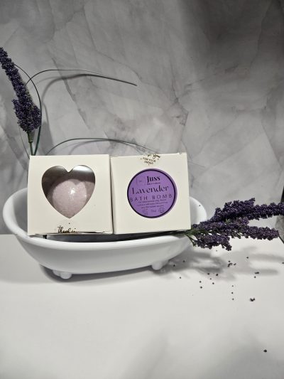 Bath bombs displayed in a bathtub dish.