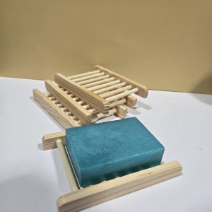 Bamboo Wood Soap Holder stacked together and one displaying a soap.